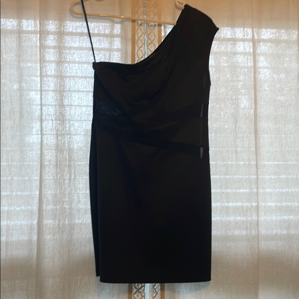 Little black off the shoulder dress.